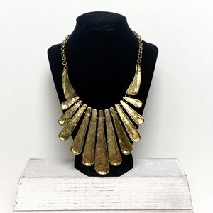 Adjustable length gold statement necklace
